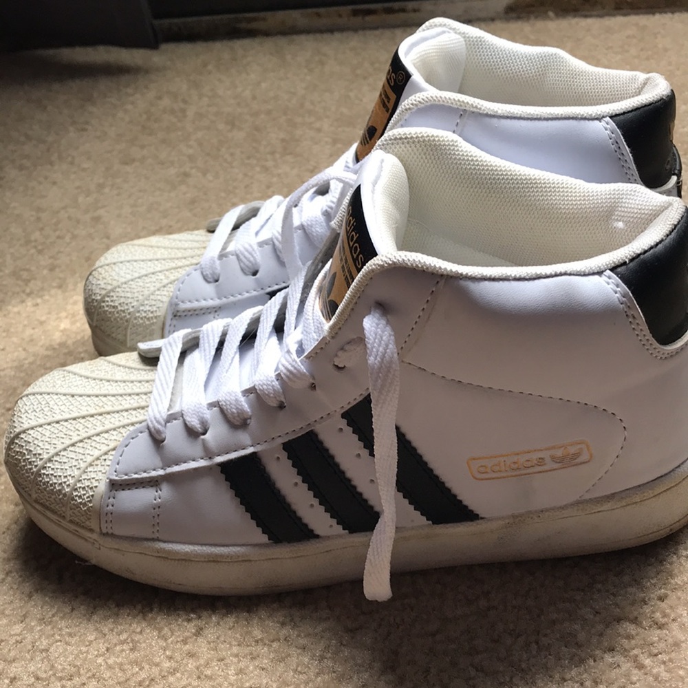 Woman’s size 7 high tops adidas shoes